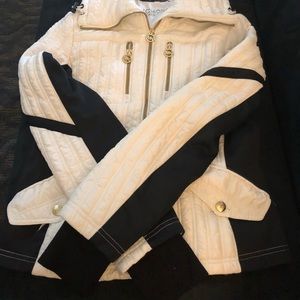 M K jacket and bang couch original